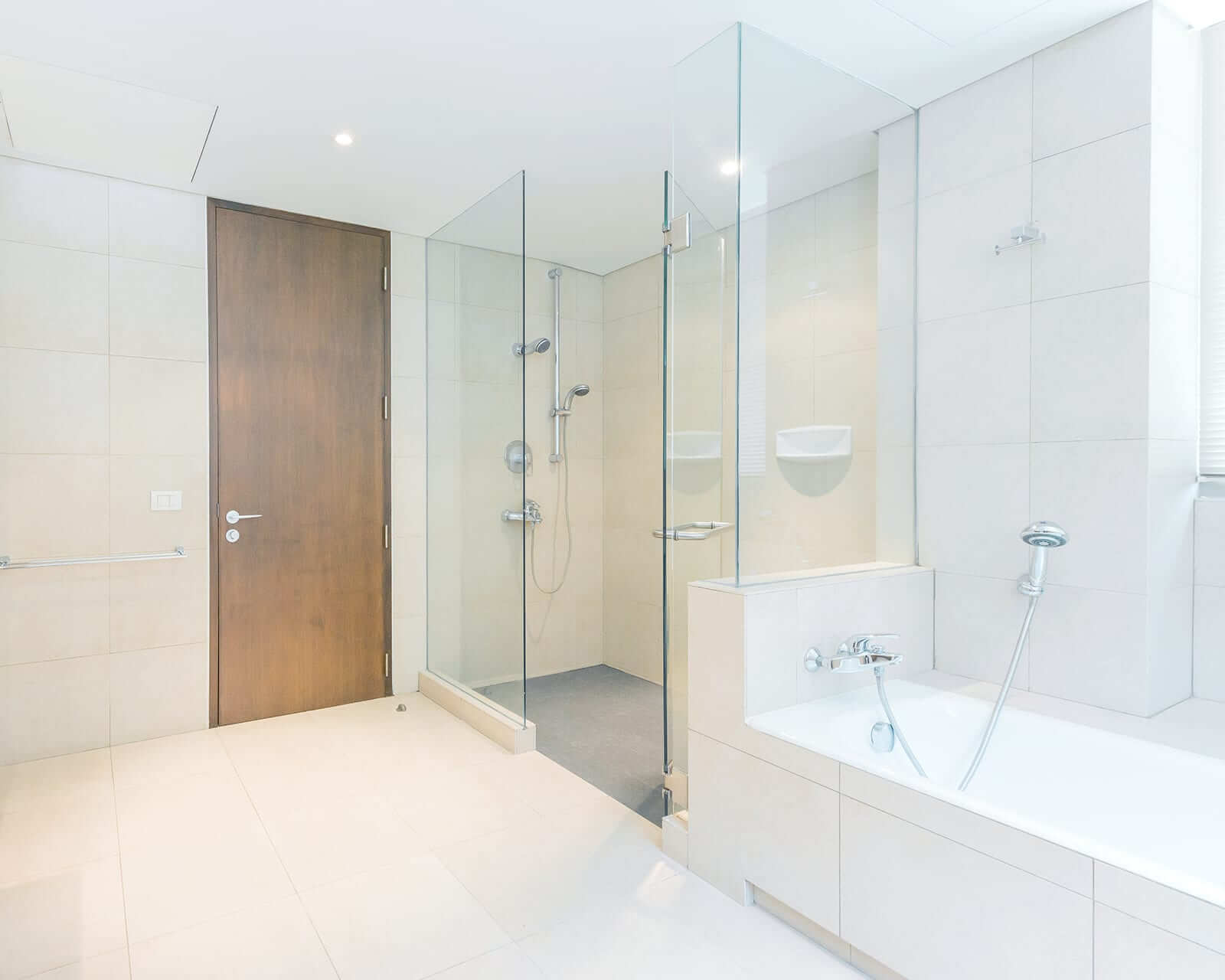 tub and single shower door in bathroom by quality frameless showers