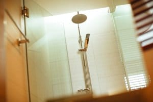 frameless shower door hardware in modern shower