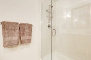 single shower doors and panel in new bathroom